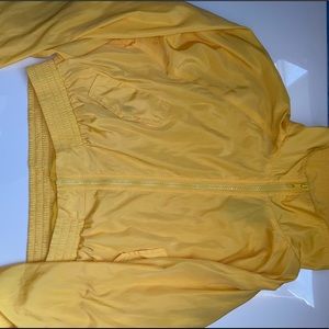 Yellow cropped windbreaker
